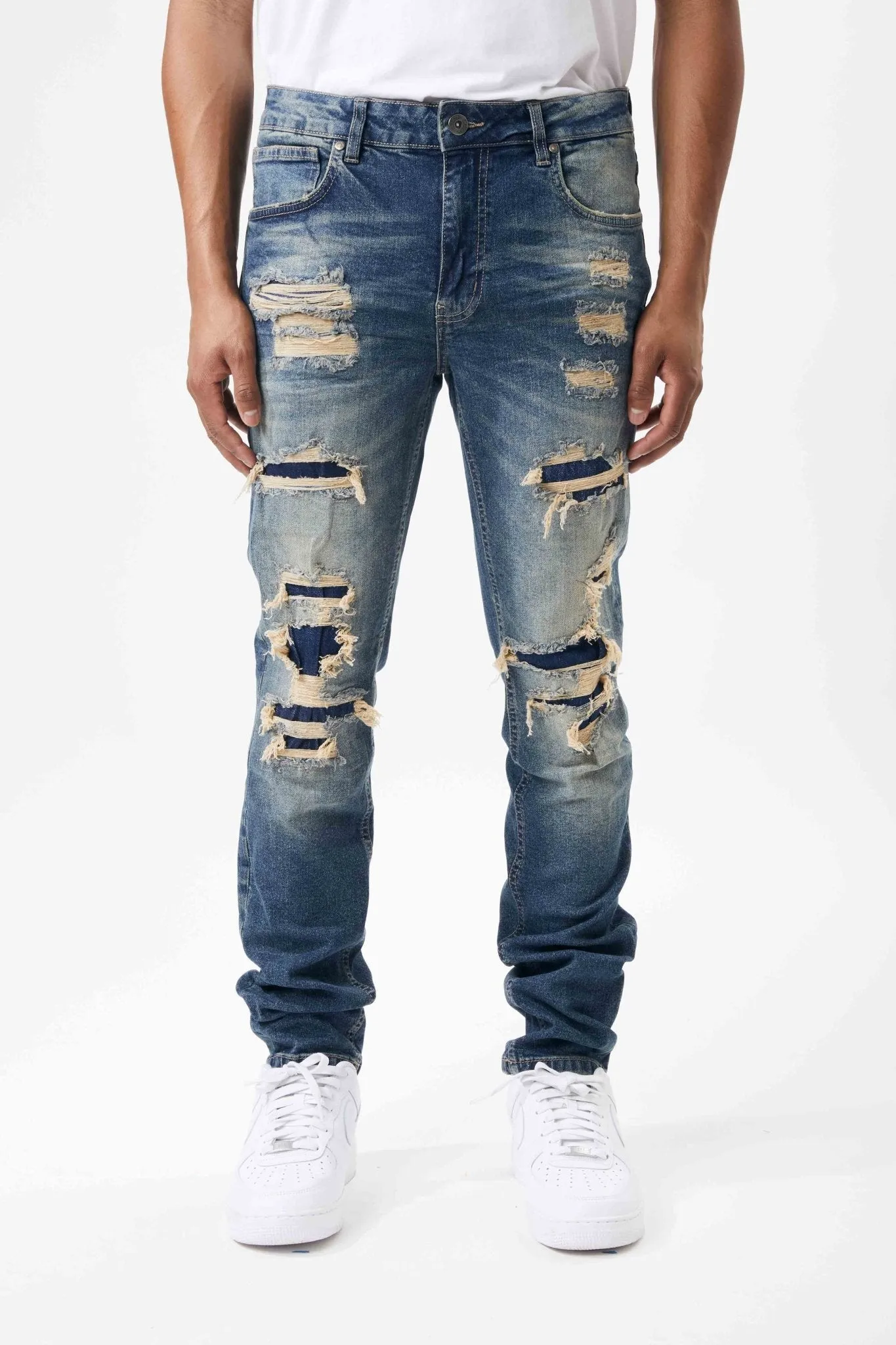 Ripped and Repaired Denim Jeans in Tint Blue